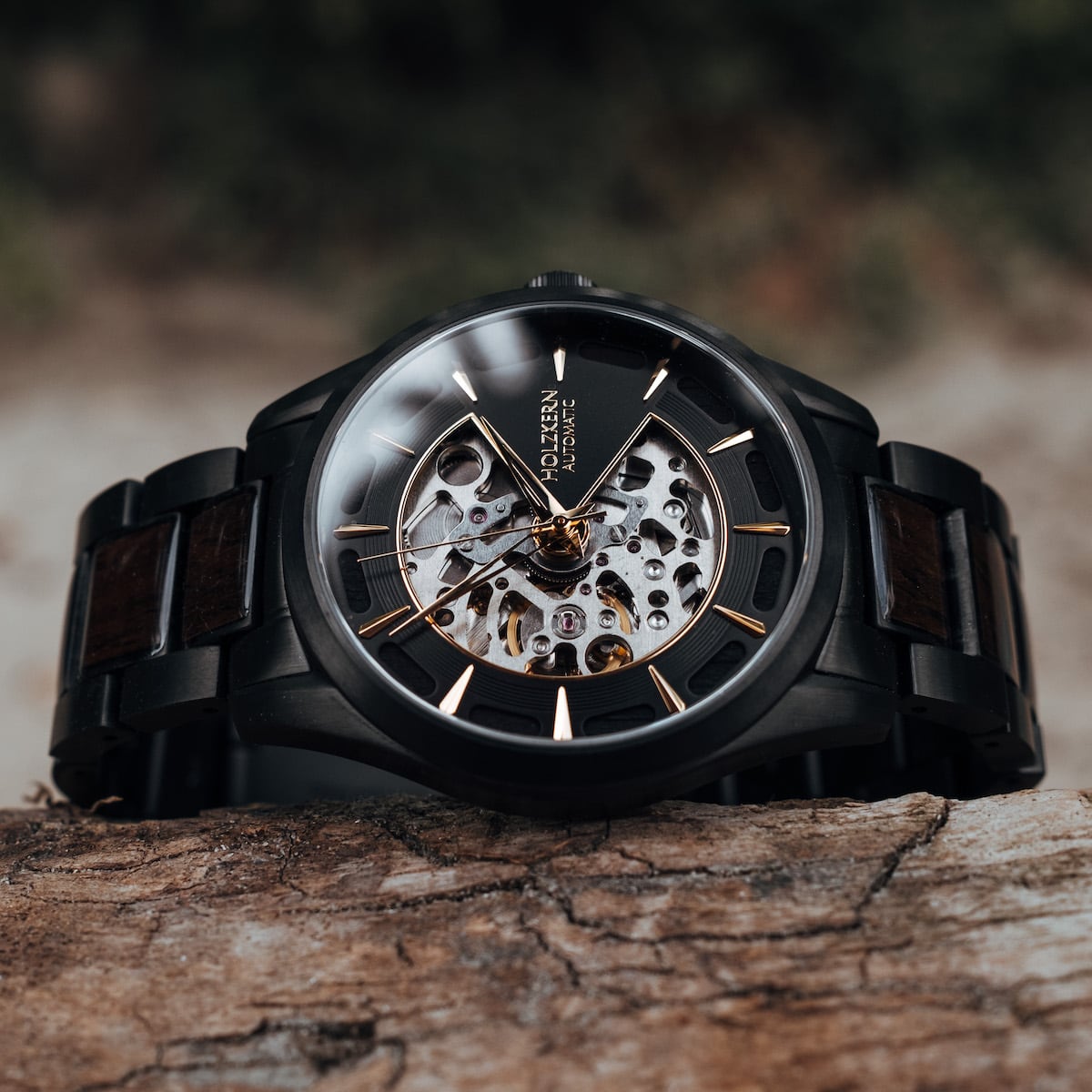 Woodleigh, a stylish watch in maple and black, features an elegant design with visible mechanics.