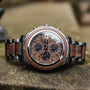 "Lipan" watch with walnut accents, featuring a classic and sophisticated design.