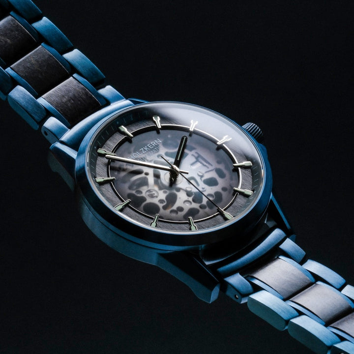 "Flowfinder" watch featuring a unique dial design with maple and blue accents.
