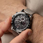 "Comfort Crusher" watch featuring a maple and silver design with a textured strap.