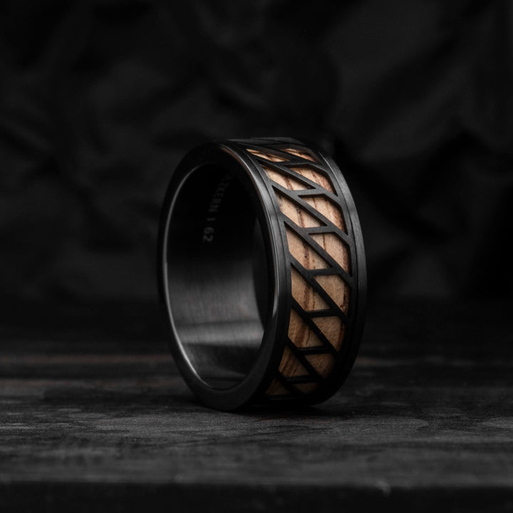 "Baritone Rings": Stylish ring featuring zebrawood and black design.