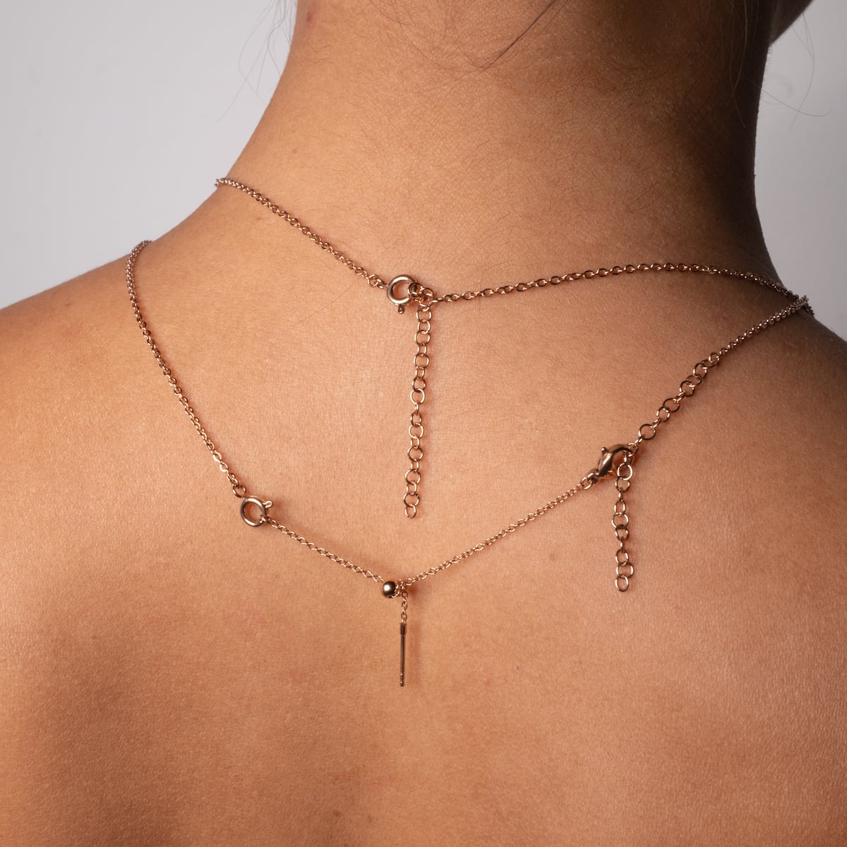 "Jewelry Extender", un extenseur de bijoux rosé avec un style de chaîne élégant, réglable de 4-8 cm.