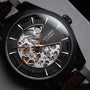 "Woodleigh" watch featuring maple and black accents with a sleek, modern design.