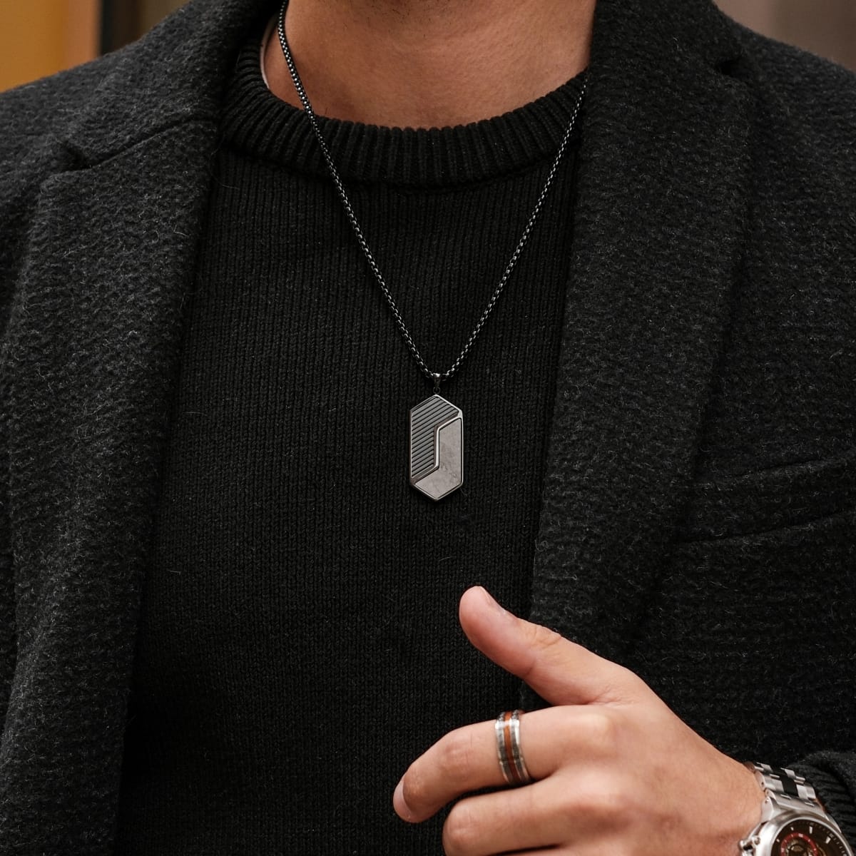 "Zigzag Necklace" - a stylish zigzag necklace with marble and black design.