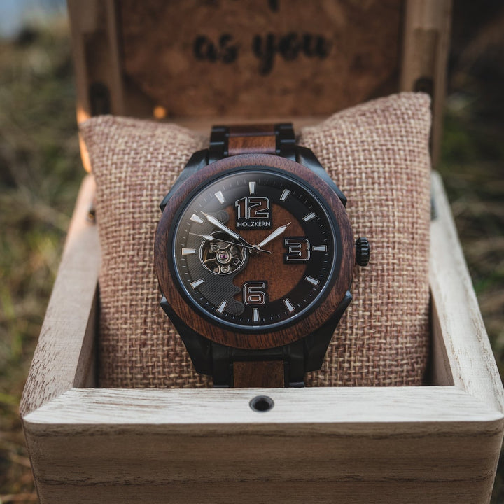 "Albert watch featuring acacia wood design and steel accents in an elegant presentation box."