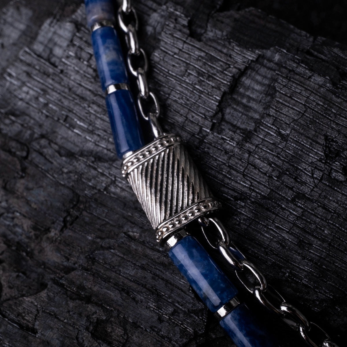 "Supersonic", a stylish marble and silver bracelet with intricate detailing.